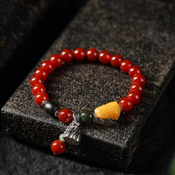 Red Agate Mala Bracelet with a Lotus Charm