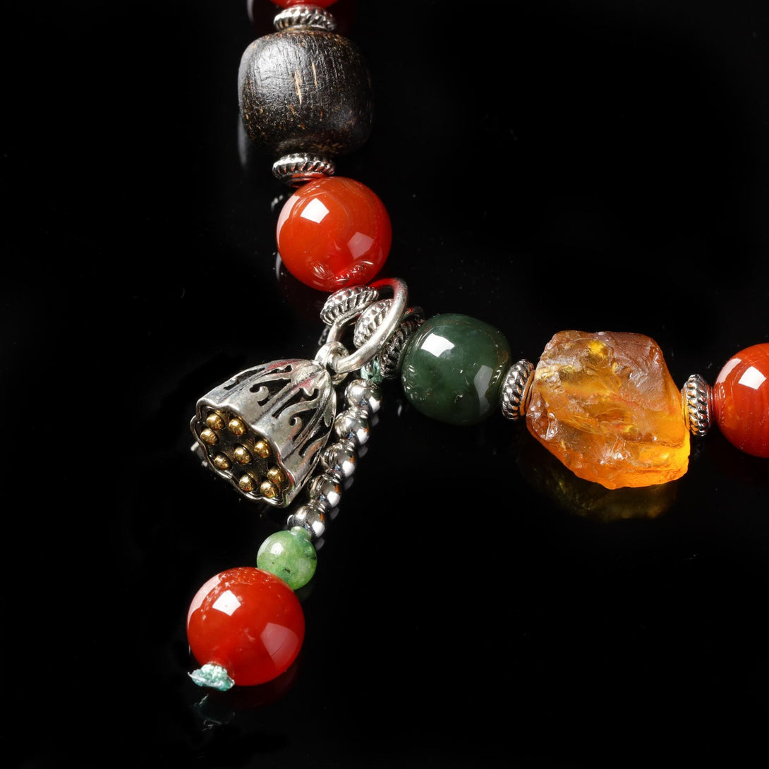 Red Agate Mala Bracelet with a Lotus Charm