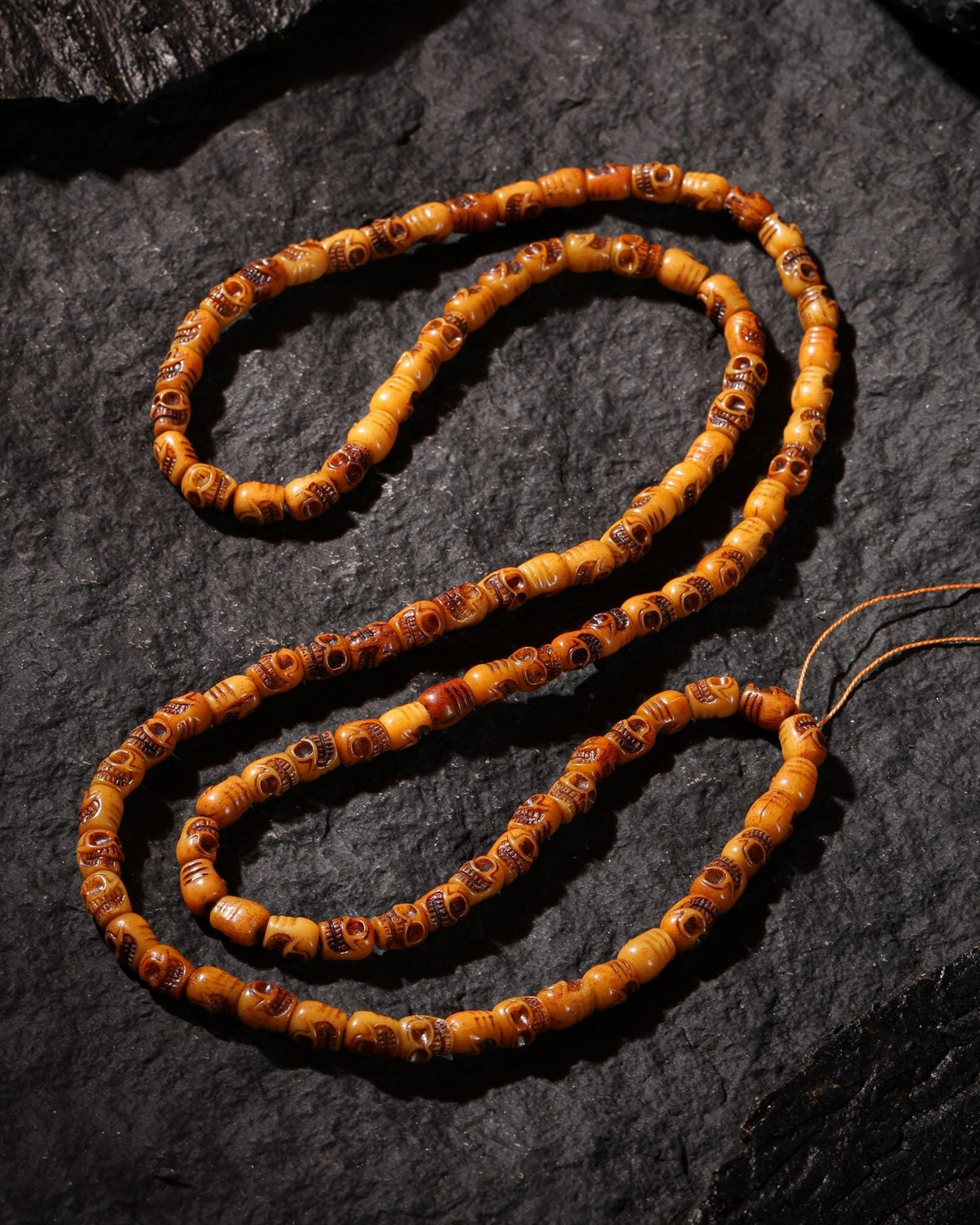 Collana con teschio d'osso 108 Mala