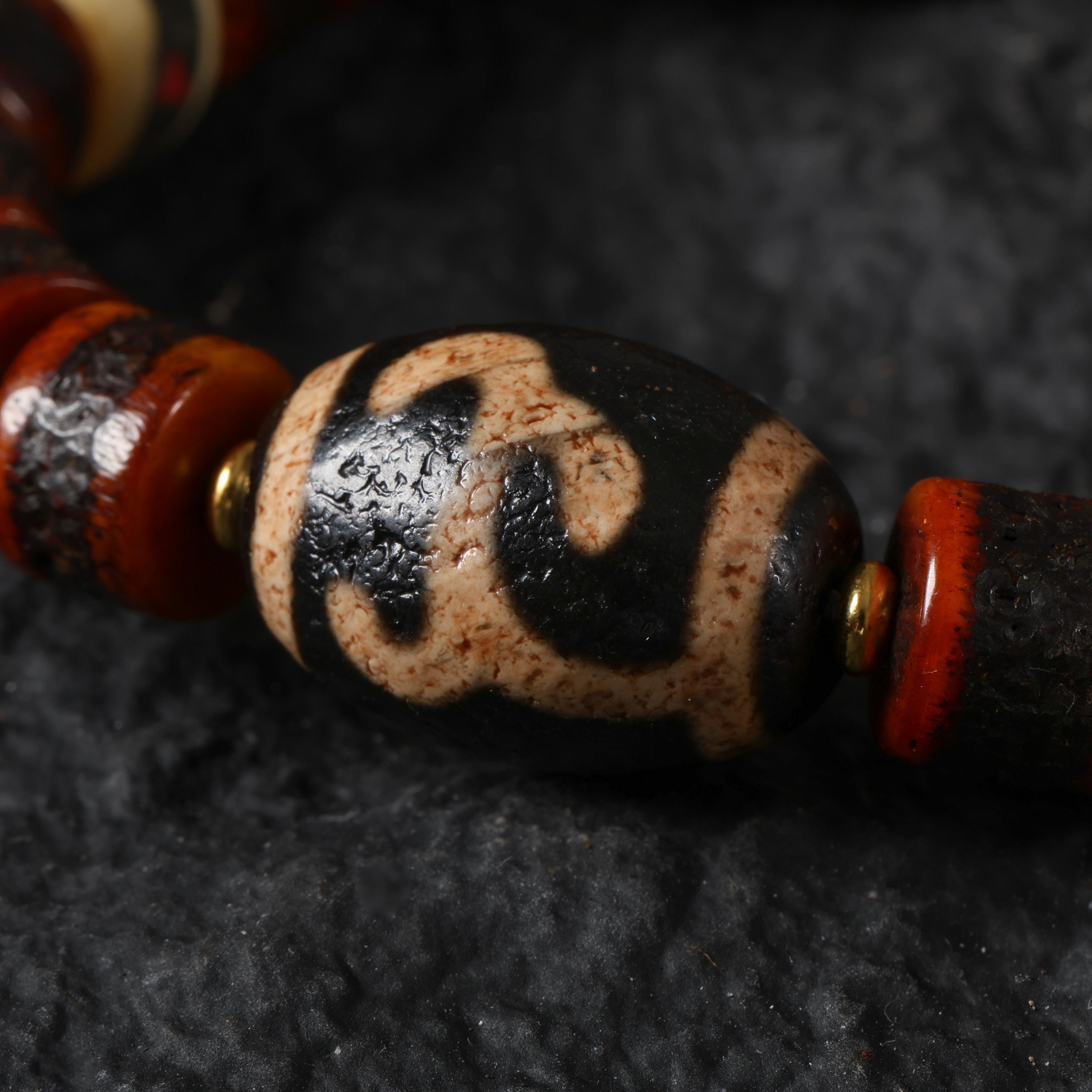 Red Yak Bone Bracelet with Skull & Dzi Beads