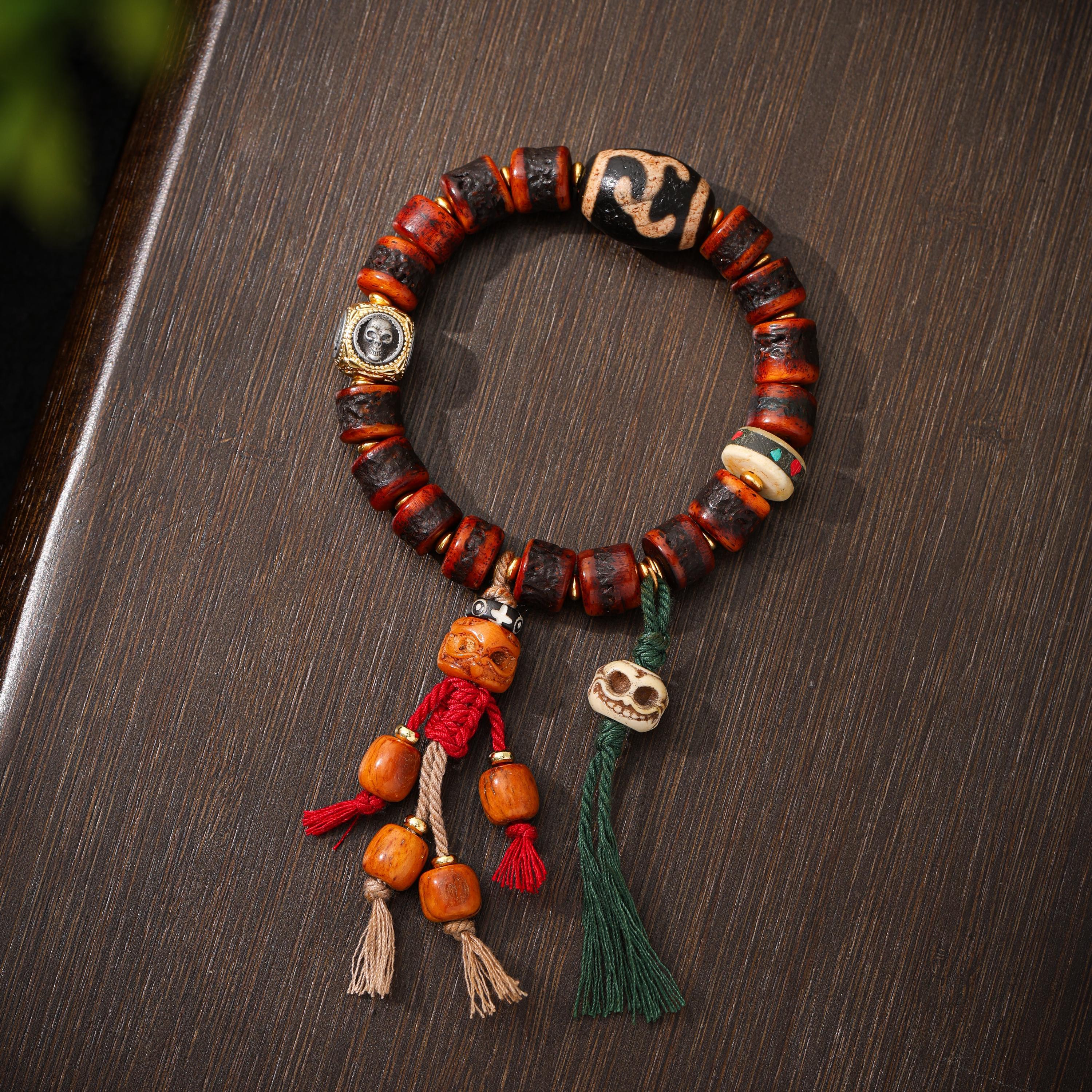Red Yak Bone Bracelet with Skull & Dzi Beads