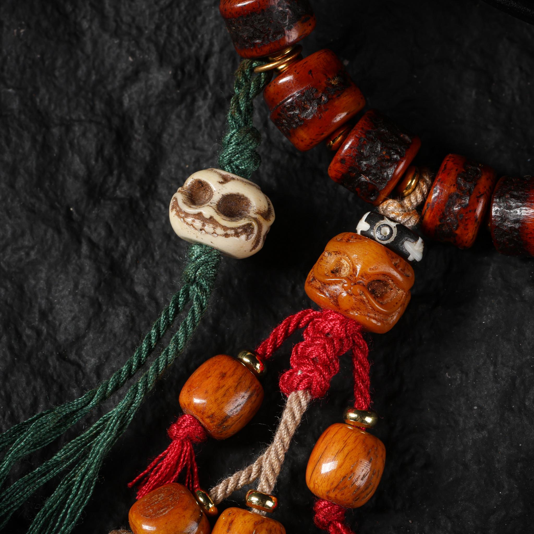Red Yak Bone Bracelet with Skull & Dzi Beads