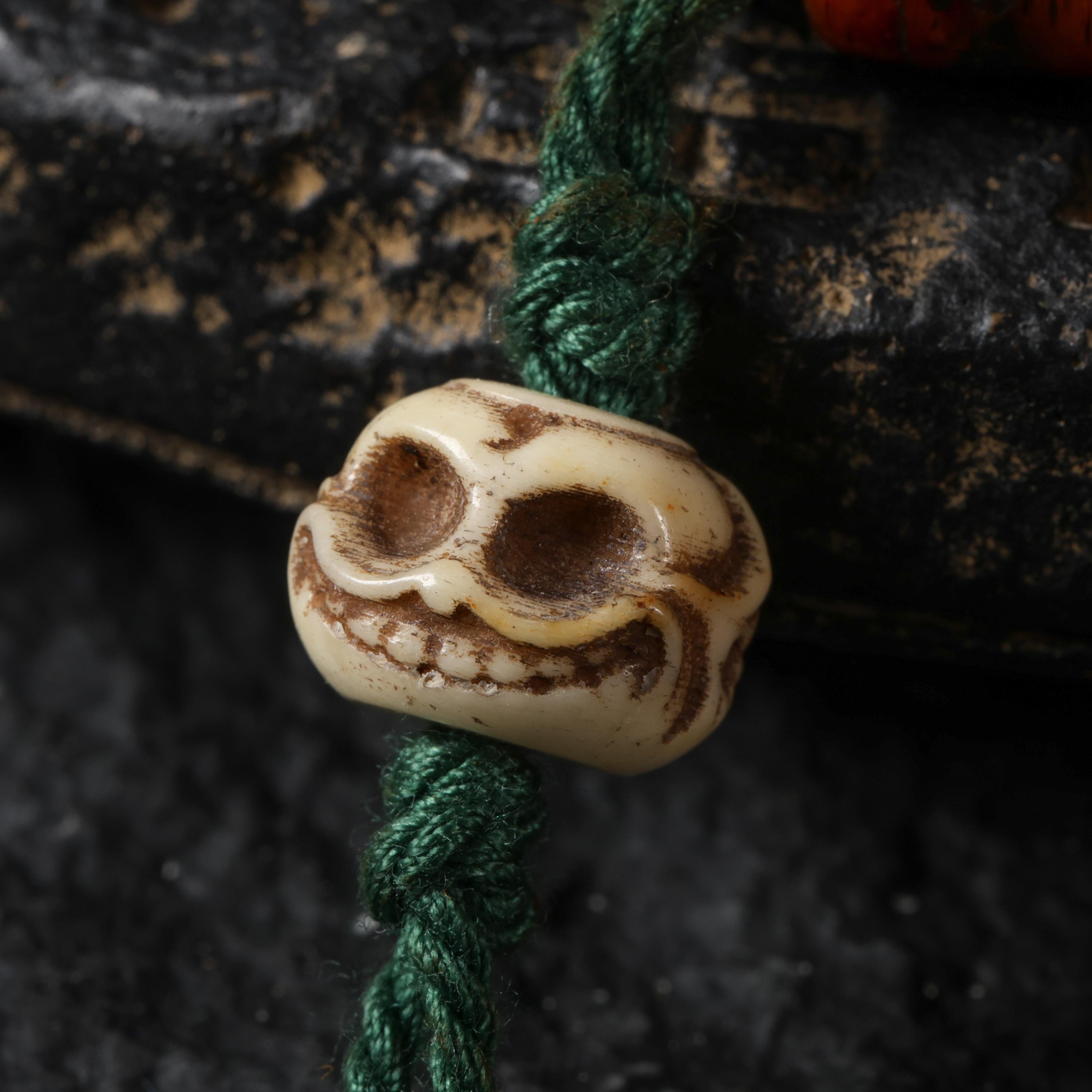 Red Yak Bone Bracelet with Skull & Dzi Beads