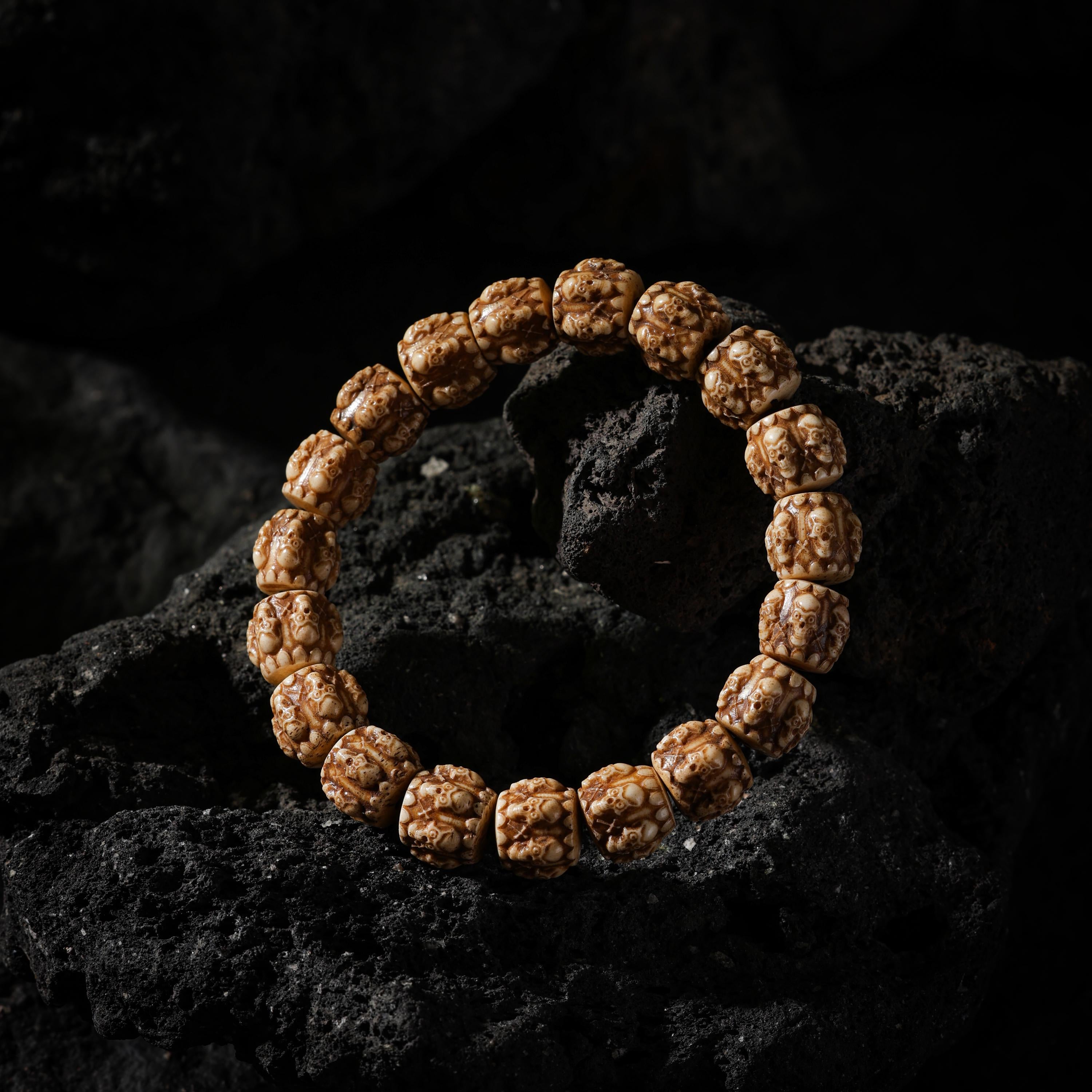 AURA DEER Six-Faced Yak Bone Skull Beaded Bracelet