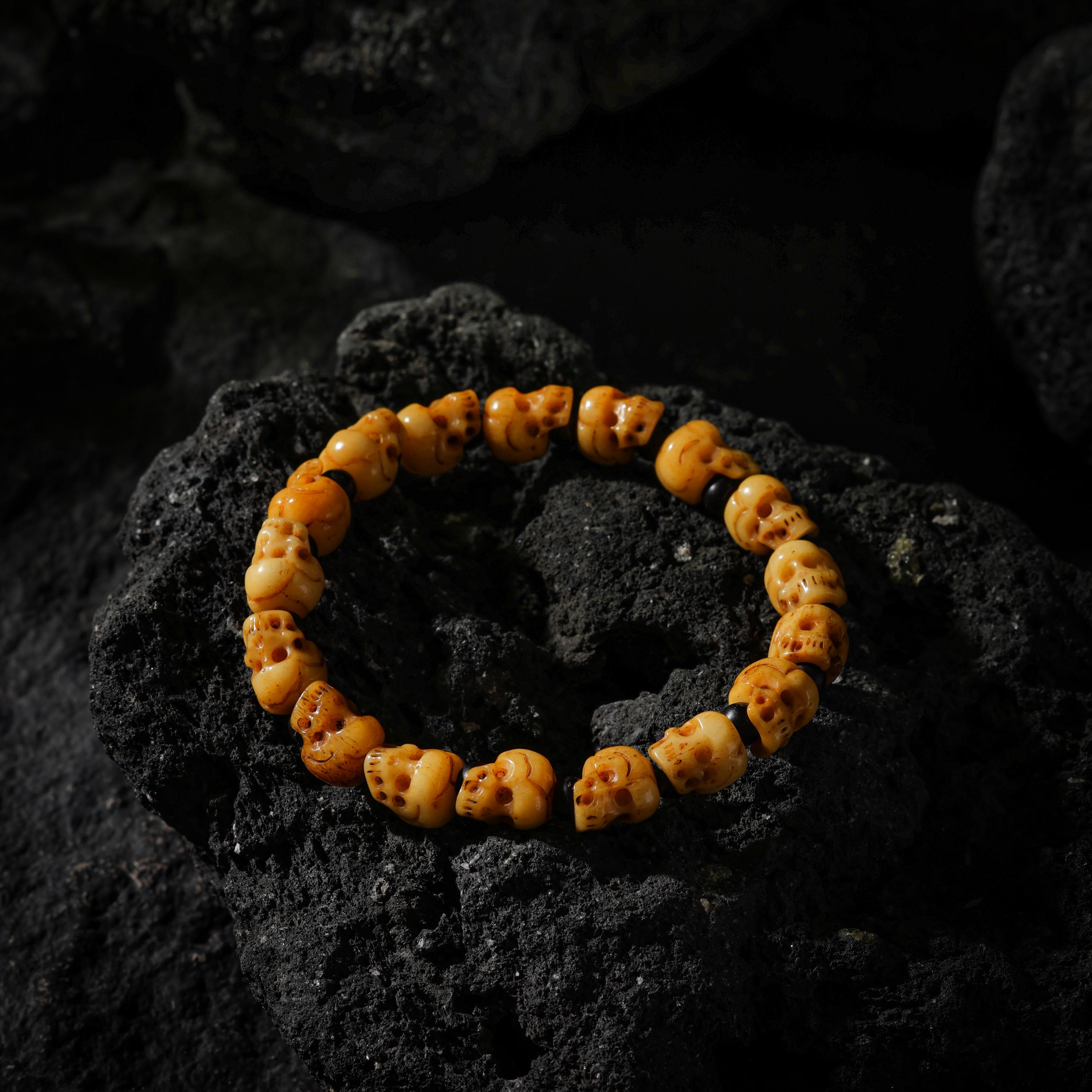 AURA DEER Hand-Carved Yak Bone Skull and Black Agate Bracelet