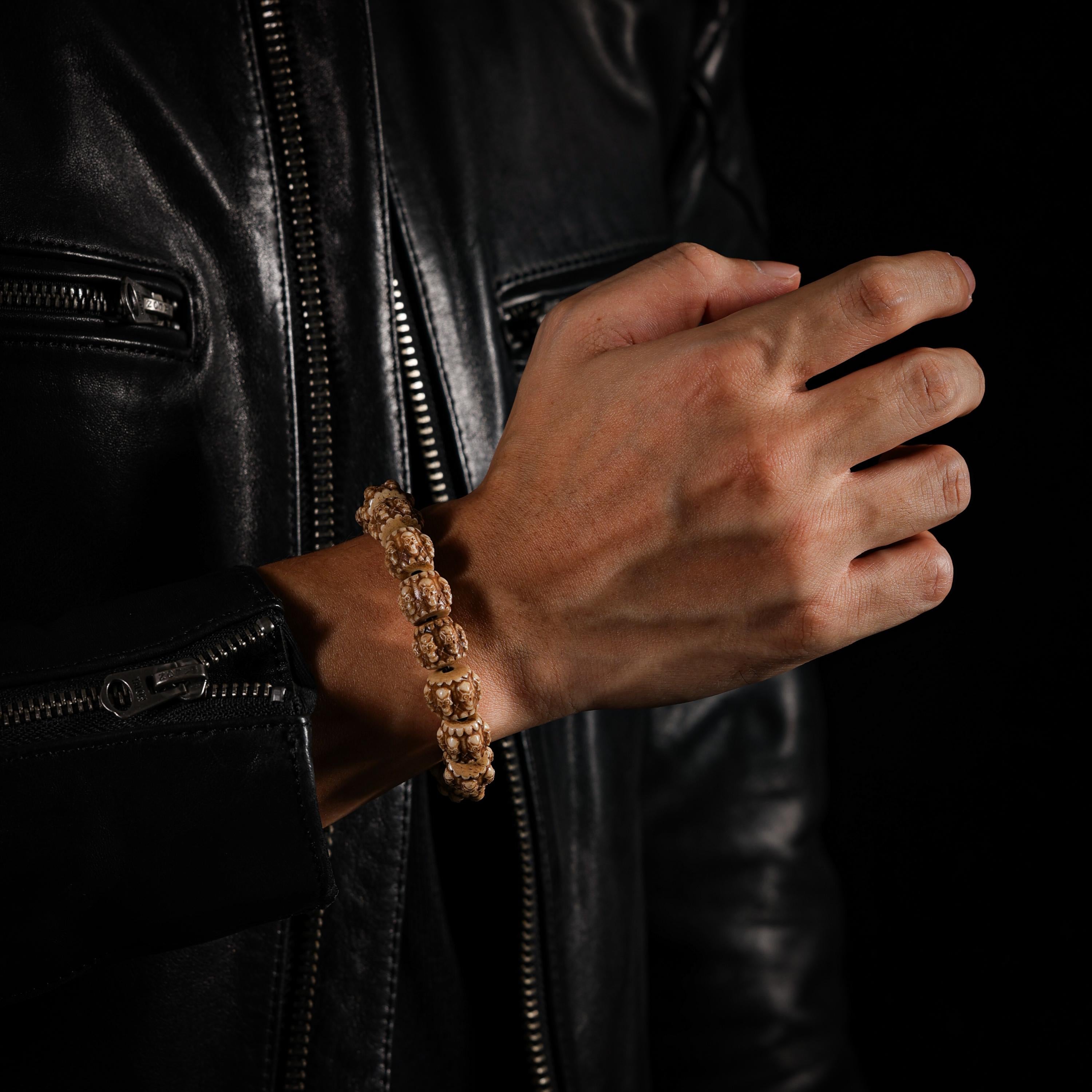 AURA DEER Six-Faced Yak Bone Skull Beaded Bracelet