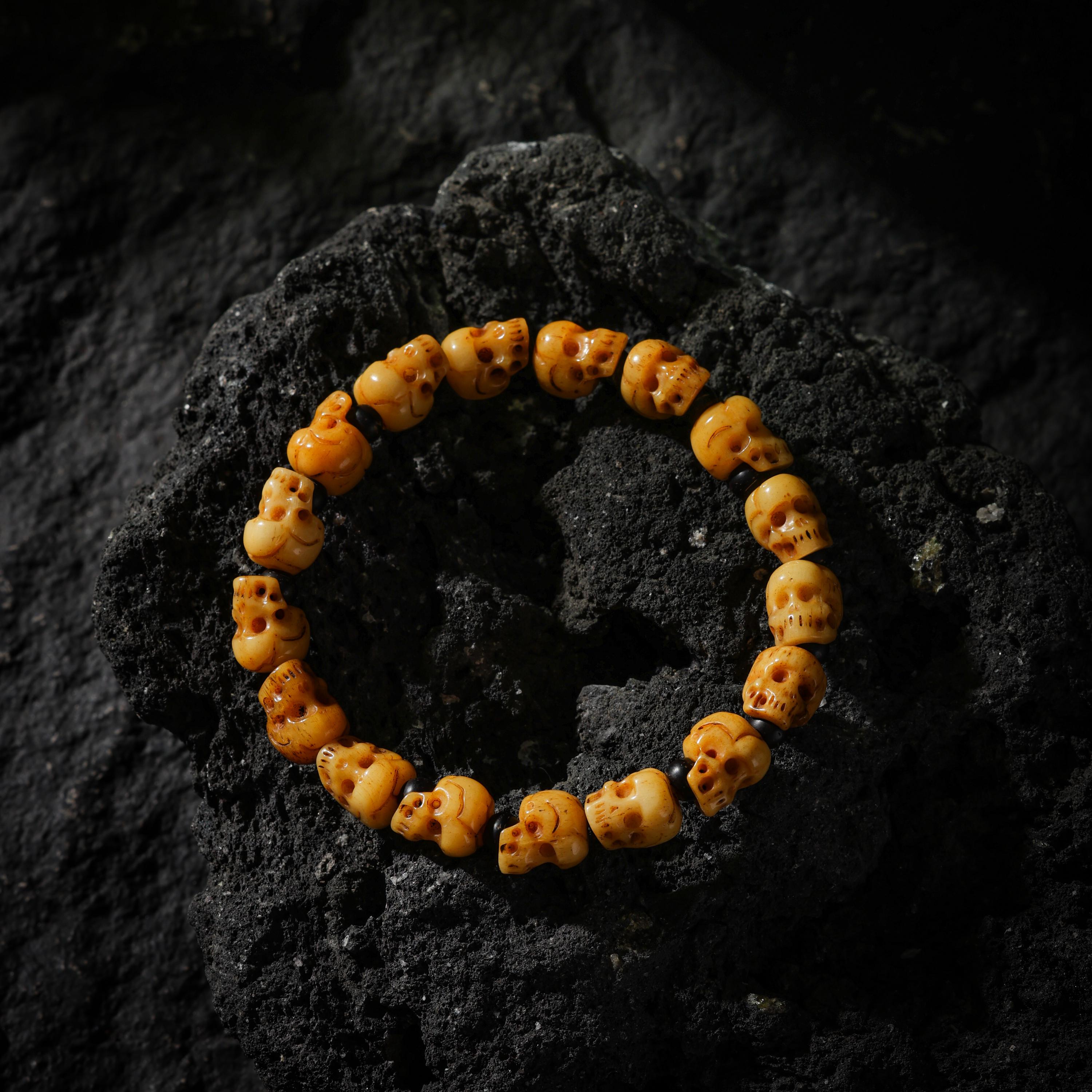 AURA DEER Hand-Carved Yak Bone Skull and Black Agate Bracelet